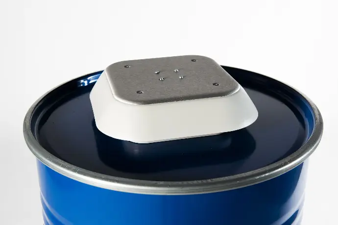 alt="Top view of a blue Barrel with a metal and plastic cap, designed for energy storage solutions"