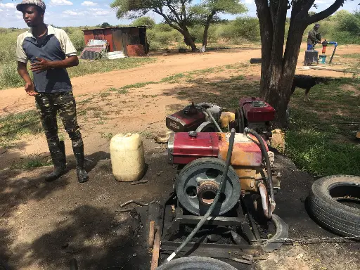 alt="Rural energy setup in Botswana with a diesel generator and local resources"