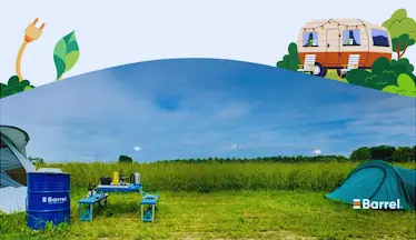 alt="Barrel solar energy system powering a campsite with tents and a caravan in a green field"